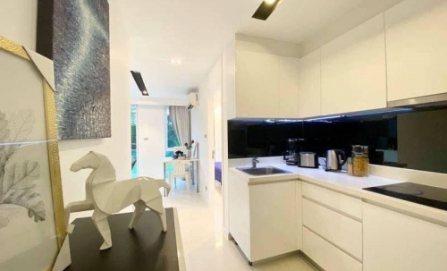 ขายพร้อมผู้เช่า City Center Residence พัทยากลาง 2 ห้องนอน ชั้น 1 วิวสวน